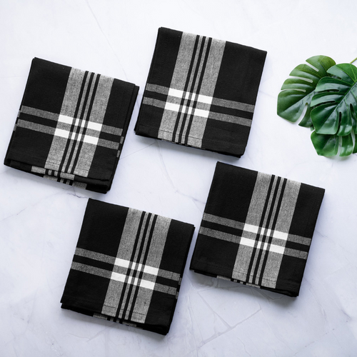 Cozy and modern kitchen setting with high-quality cotton kitchen towels, including one checkered and three striped, neatly folded and presented in a stylish gift box with gourmet cooking utensils and fresh fruits. Cozy and modern kitchen setting with high-quality cotton kitchen towels, including one checkered and three striped, neatly folded and presented in a stylish gift box with gourmet cooking utensils and fresh fruits.