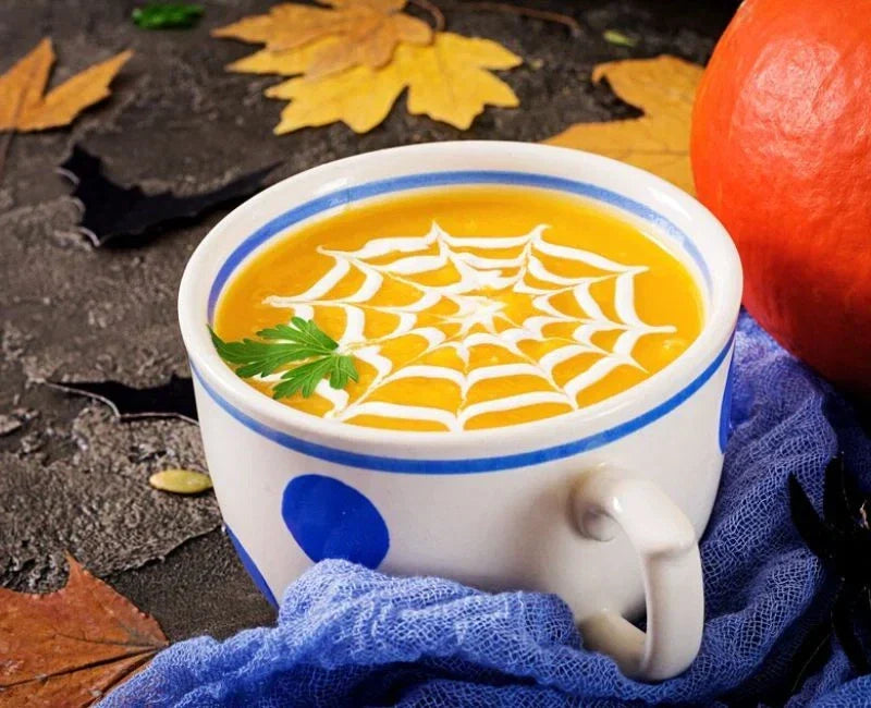 Spooky Pumpkin Soup with Spider Web Topping for Halloween! Spooky Pumpkin Soup with Spider Web Topping for Halloween!