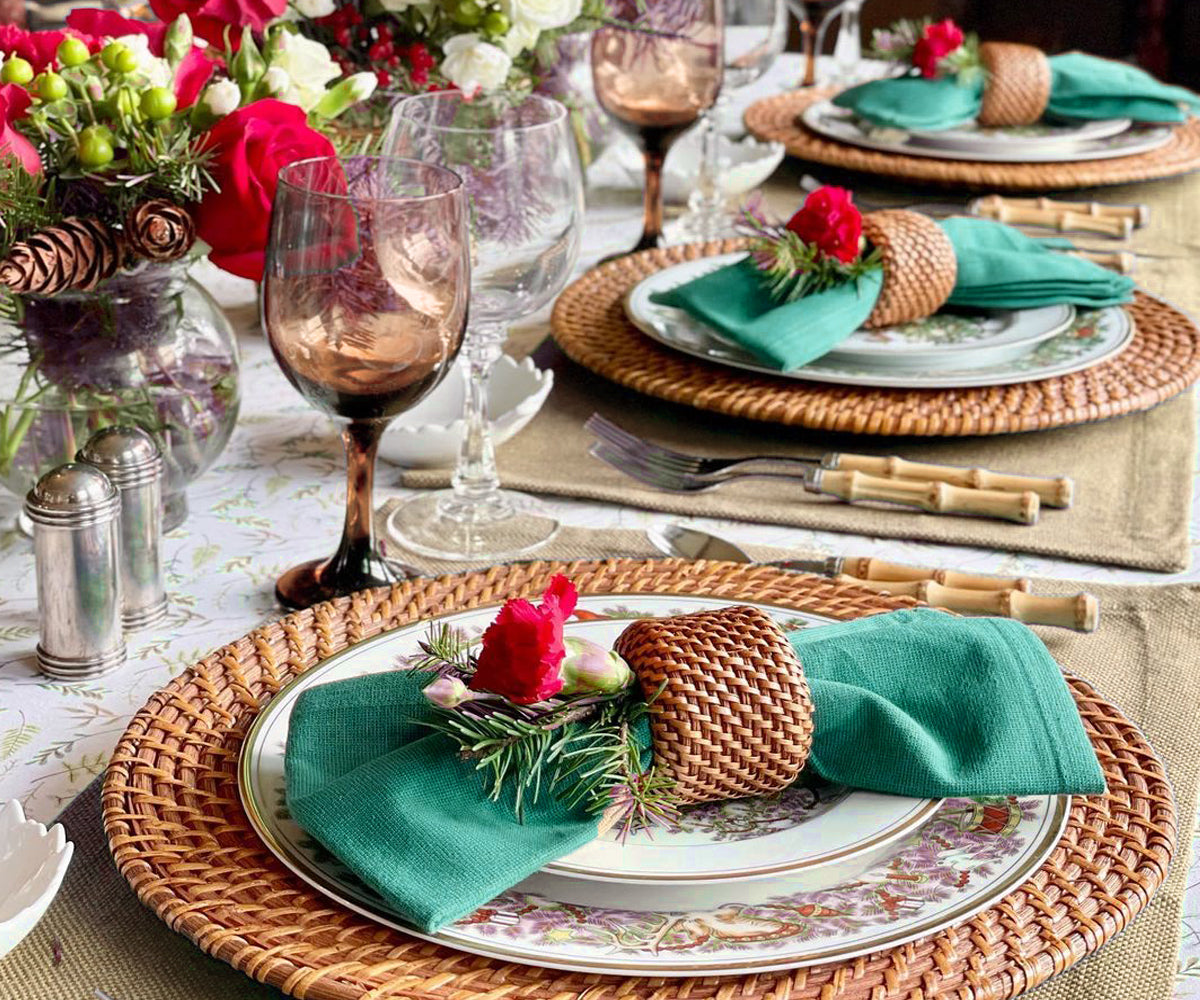 Rustic dining table set with beige placemats and matching napkins. Rustic dining table set with beige placemats and matching napkins.