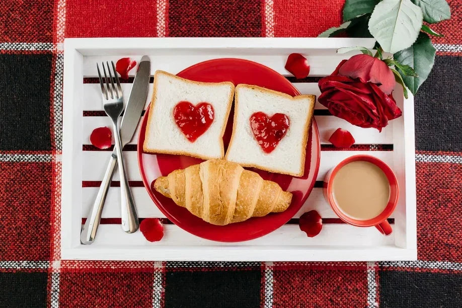 Romantic Valentine's Day dinner table setting with elegant food specials Romantic Valentine's Day dinner table setting with elegant food specials