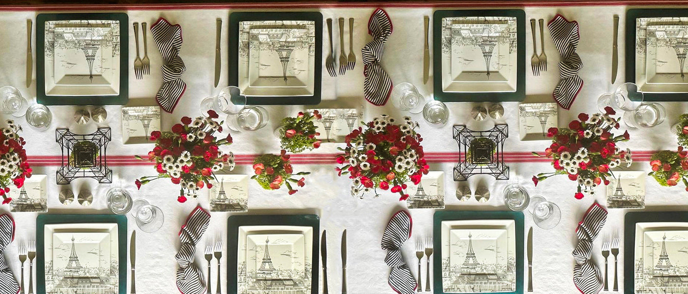 Beautiful kitchen and dining setup featuring tablecloths, napkins, and placemats. Beautiful kitchen and dining setup featuring tablecloths, napkins, and placemats.