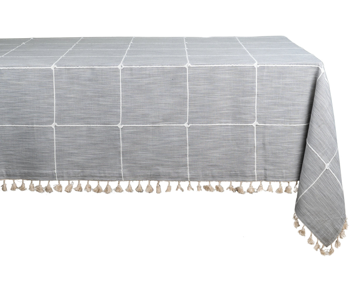 Classic plaid tablecloth with tassel trim, adding a touch of farmhouse charm to your table. Classic plaid tablecloth with tassel trim, adding a touch of farmhouse charm to your table.