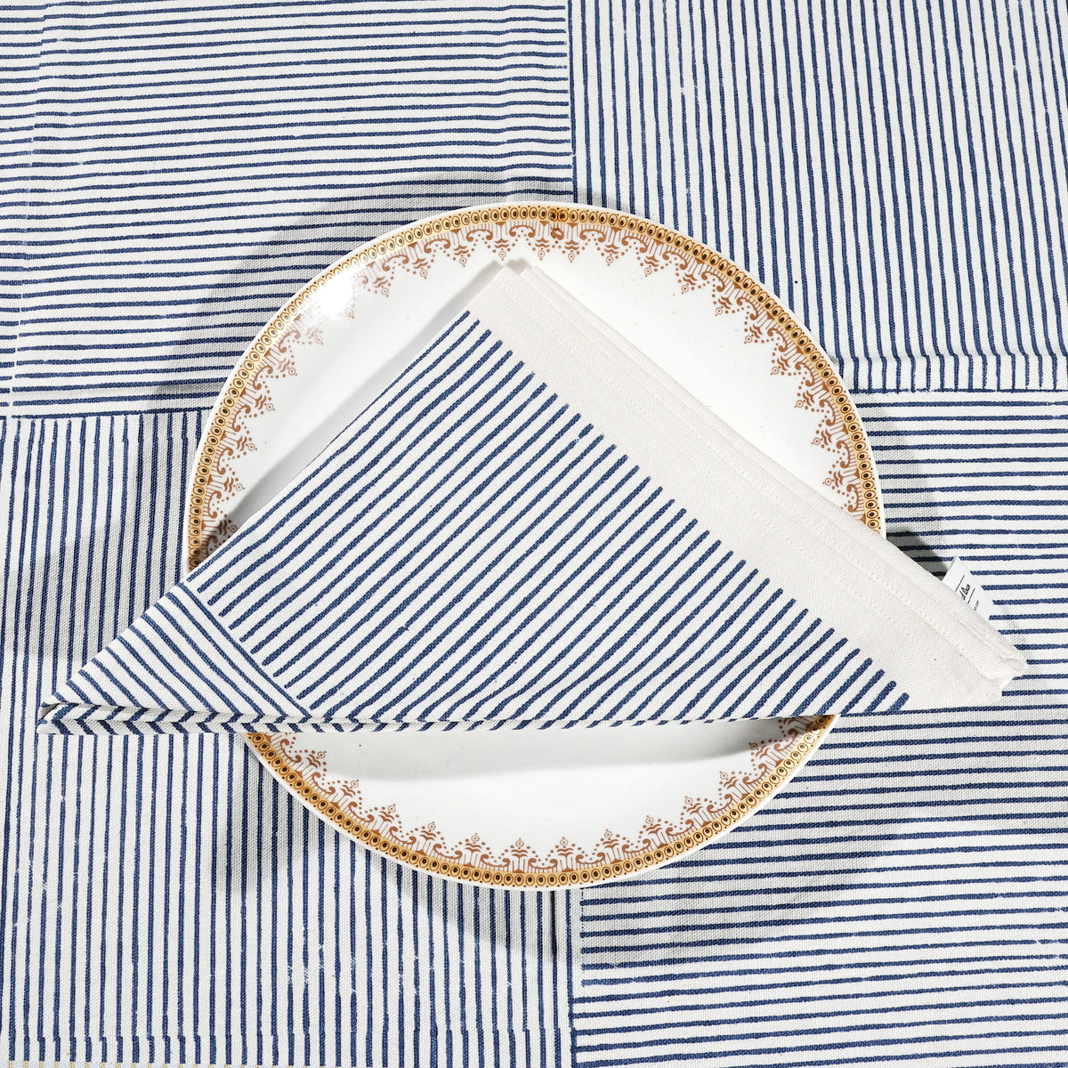 Set of 4 blue cotton cloth napkins with striped block printed design, 20x20 inches, eco-friendly and reusable, ideal for dinner or everyday use. Set of 4 blue cotton cloth napkins with striped block printed design, 20x20 inches, eco-friendly and reusable, ideal for dinner or everyday use.