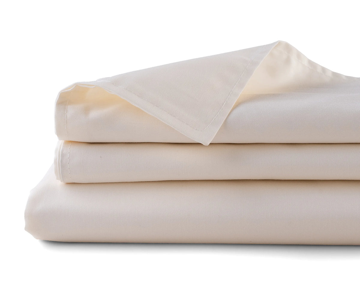 Eco-friendly undyed cotton sateen flat sheet folded neatly for display Eco-friendly undyed cotton sateen flat sheet folded neatly for display