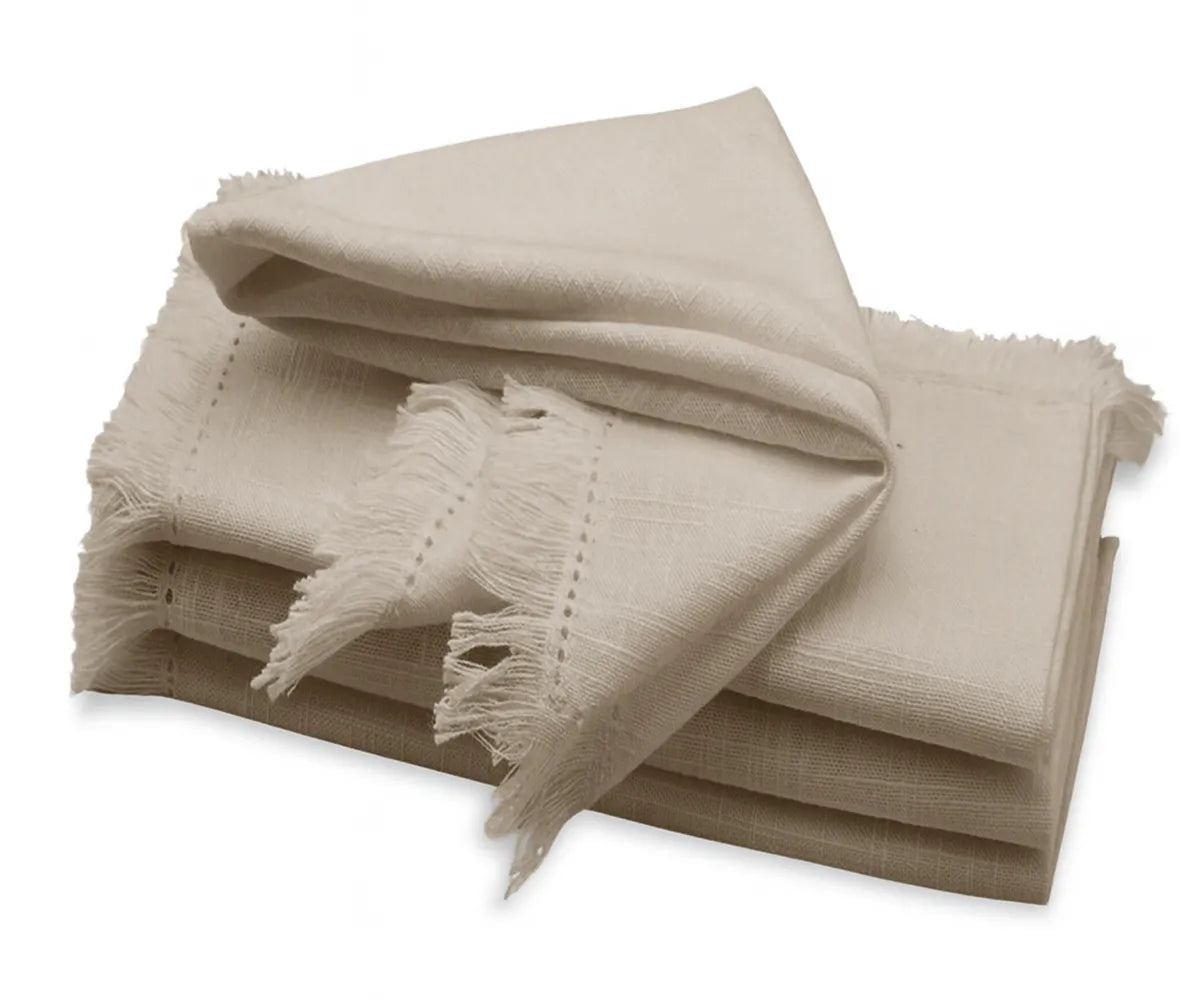 Beige Fringe Cotton Napkins on a Dinner Table – Reusable Cloth Napkins with Stylish Fringe Edges Beige Fringe Cotton Napkins on a Dinner Table – Reusable Cloth Napkins with Stylish Fringe Edges