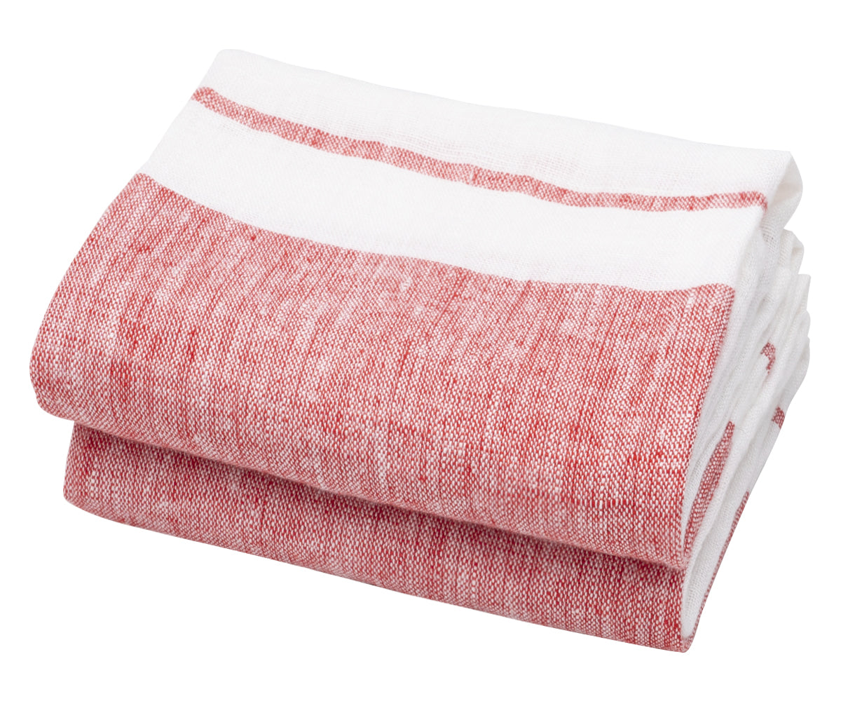 A set of two folded red Belgian linen tea towels with a white stripe. A set of two folded red Belgian linen tea towels with a white stripe.
