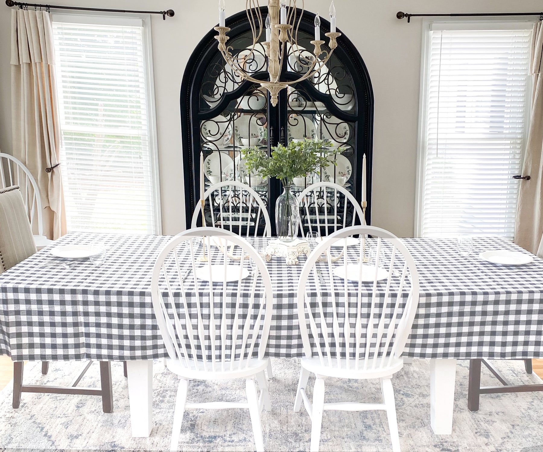 Stylish gingham checkered plaid tablecloth, a classic choice for any table. Stylish gingham checkered plaid tablecloth, a classic choice for any table.