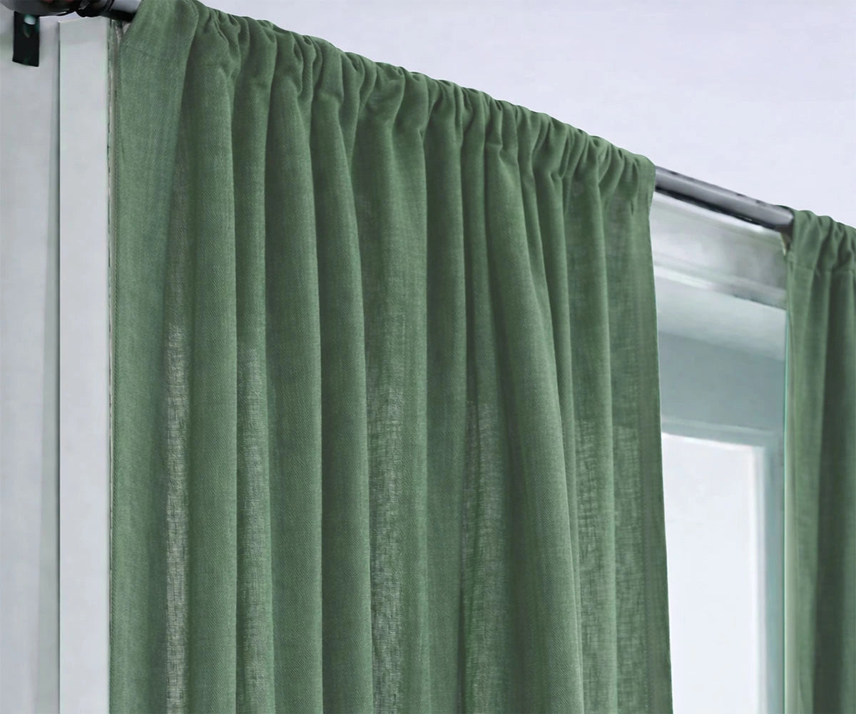 Deep forest green linen curtains for living rooms, offering a rich, elegant finish while maintaining breathable comfort Deep forest green linen curtains for living rooms, offering a rich, elegant finish while maintaining breathable comfort
