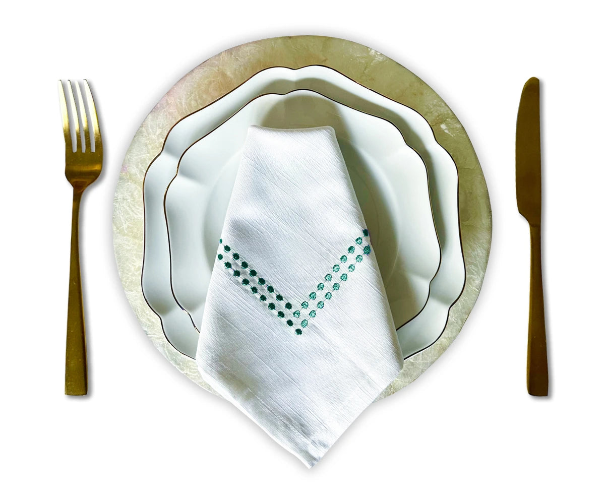 Green and white Christmas-themed cloth napkins Green and white Christmas-themed cloth napkins