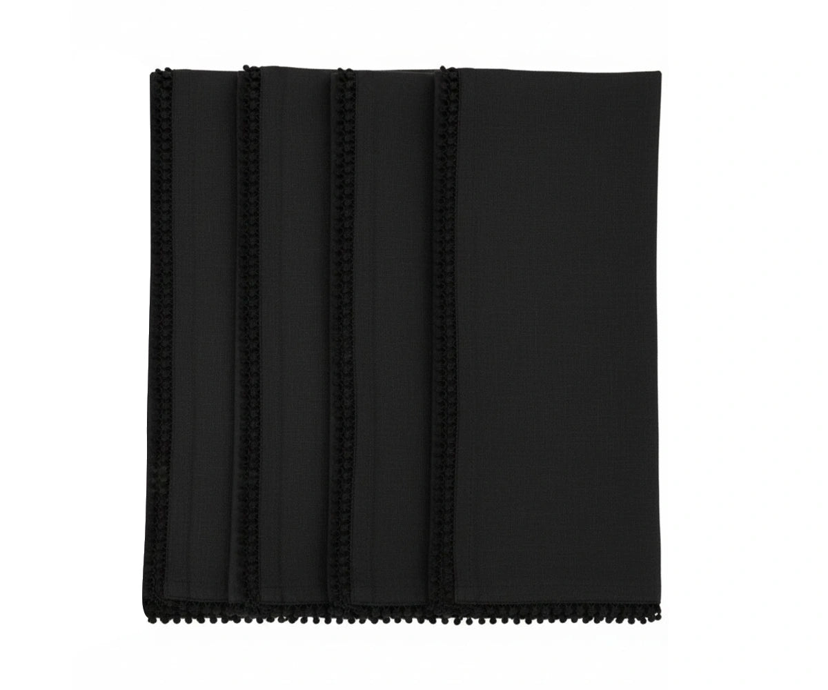 Black cotton pom pom edge napkin with decorative knotted trim Black cotton pom pom edge napkin with decorative knotted trim