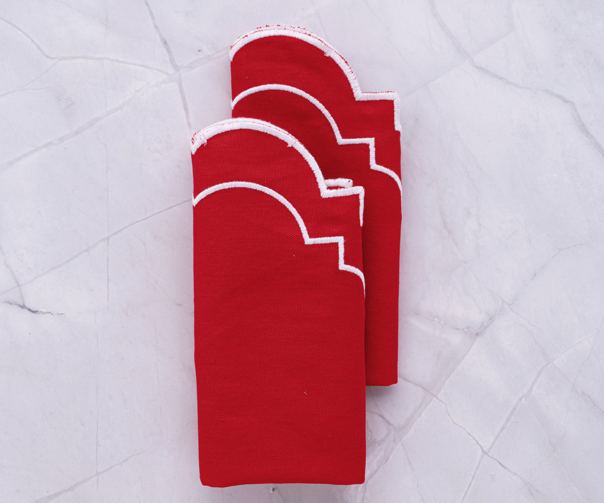 Red placemats to add a pop of color to your table.