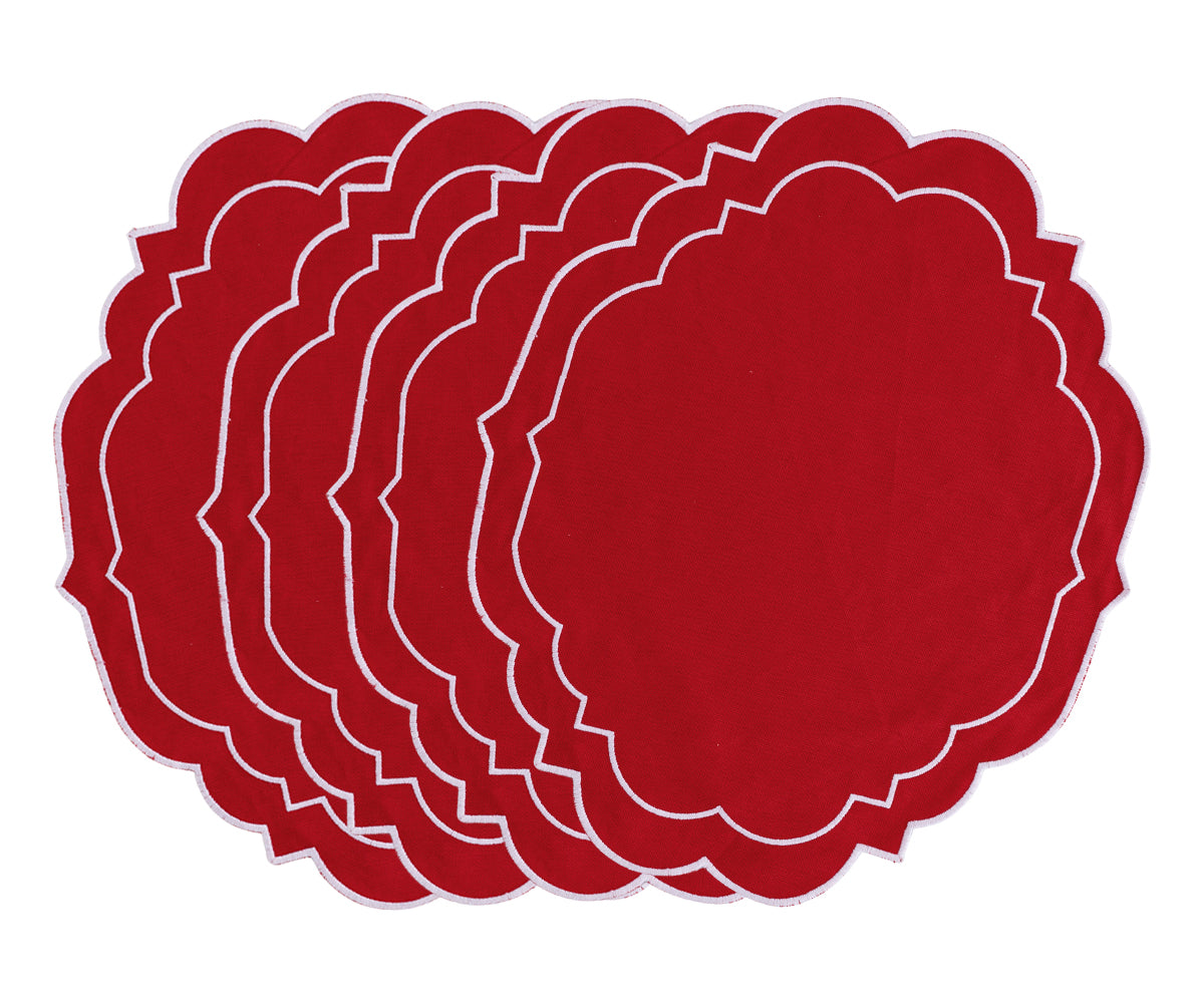 Red placemats with scalloped edges for round dining tables Red placemats with scalloped edges for round dining tables