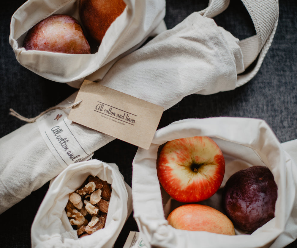 Natural cotton reusable grocery bags with sturdy stitching and drawstring, great for zero-waste shopping and food storage. Natural cotton reusable grocery bags with sturdy stitching and drawstring, great for zero-waste shopping and food storage.