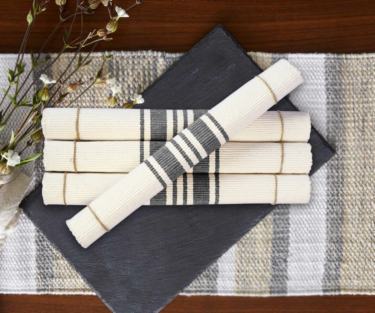 Set of four rolled Navy Blue Country Striped Placemats with textured white fabric Set of four rolled Navy Blue Country Striped Placemats with textured white fabric