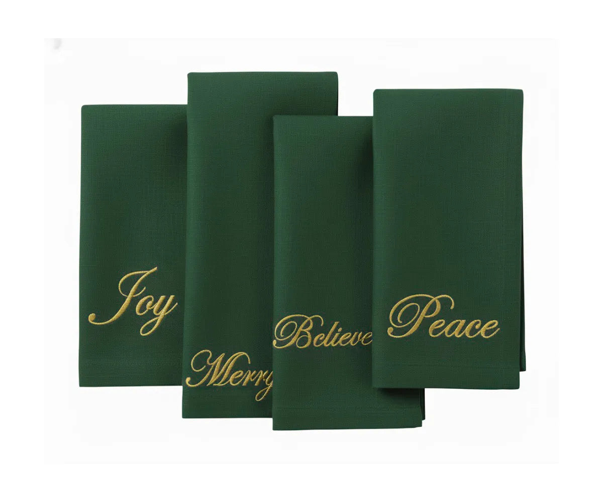 Set of dark green embroidered cotton napkins with festive words Joy, Merry, Peace, and Believe, perfect for holiday dinners and seasonal gatherings Set of dark green embroidered cotton napkins with festive words Joy, Merry, Peace, and Believe, perfect for holiday dinners and seasonal gatherings