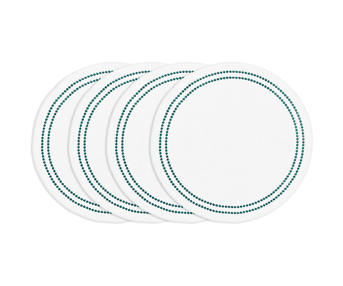 Green round cotton placemat with white embroidery and pearl accents, durable washable embroidered table accessory. Green round cotton placemat with white embroidery and pearl accents, durable washable embroidered table accessory.