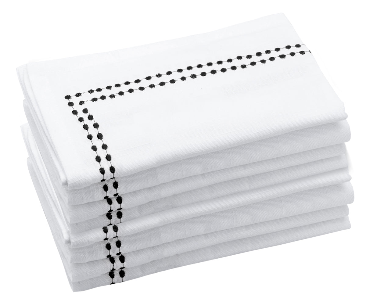 Playful dot napkins, bringing a whimsical flair to your table decor. Playful dot napkins, bringing a whimsical flair to your table decor.