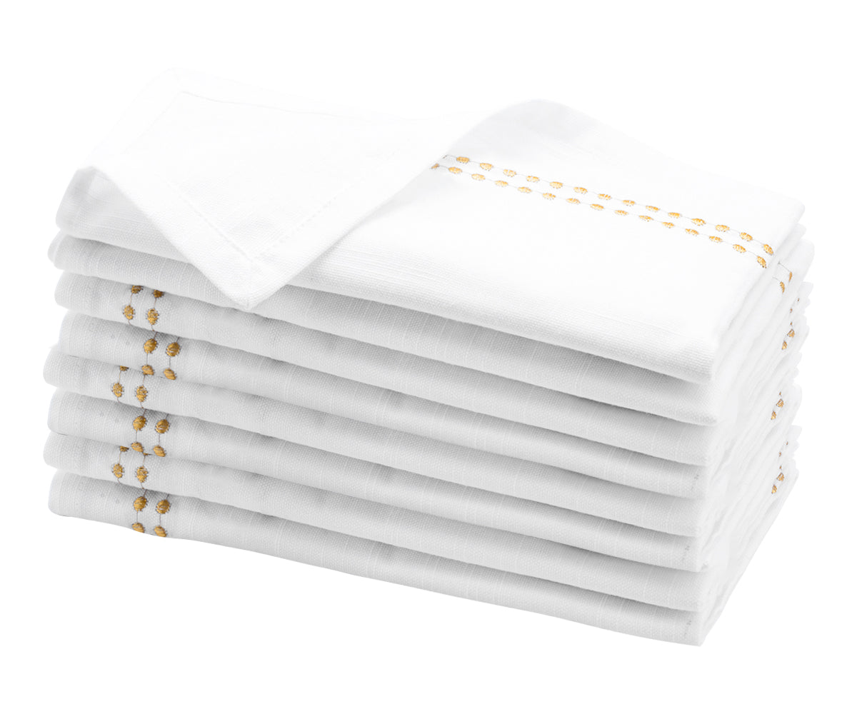 Luxurious white cotton napkins, offering both style and practicality for any meal.