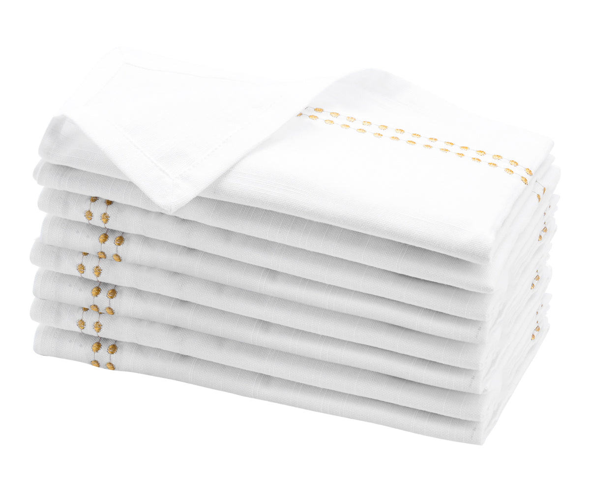 Luxurious white cotton napkins, offering both style and practicality for any meal. Luxurious white cotton napkins, offering both style and practicality for any meal.