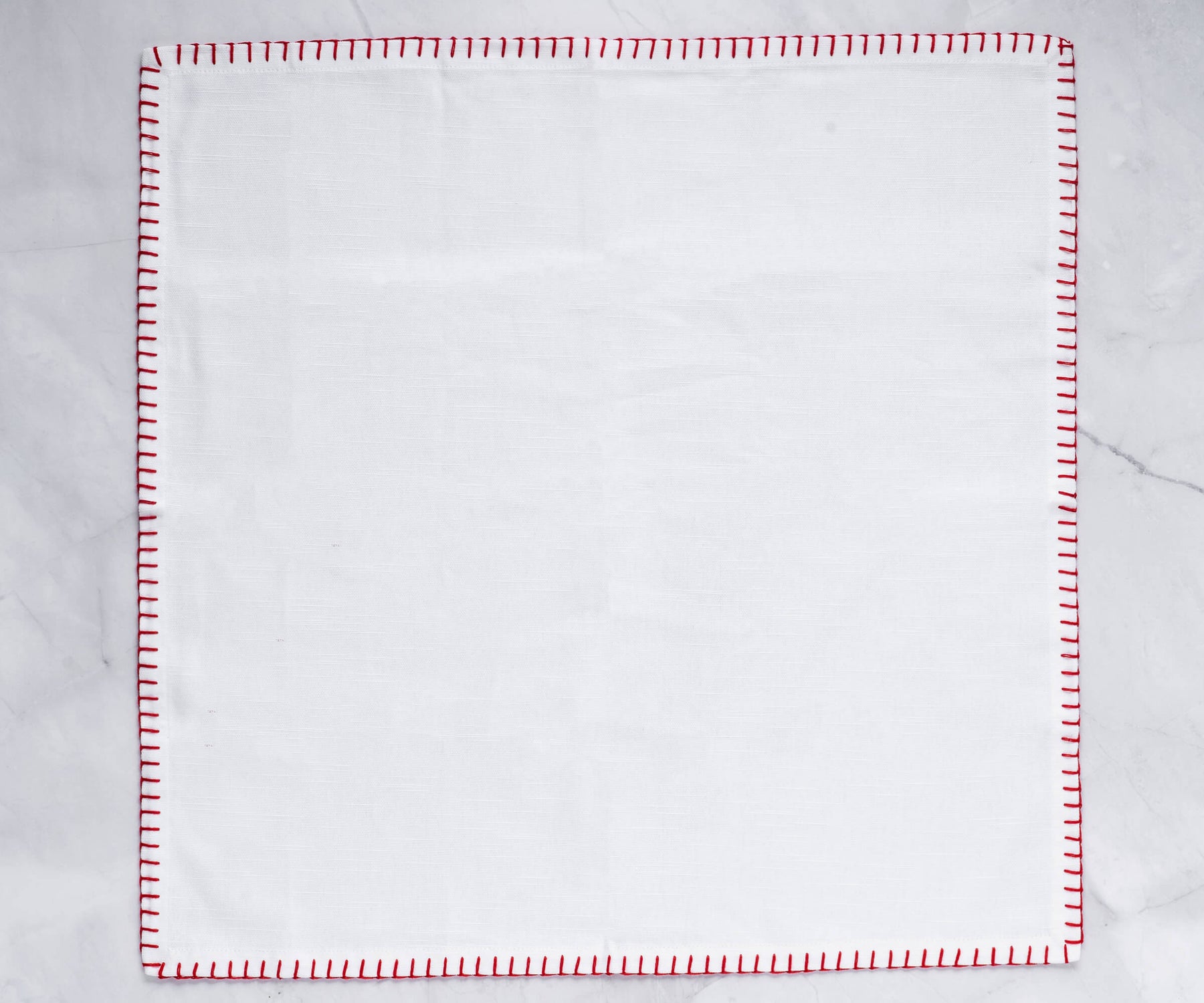 Single shell edge wedding napkin with intricate red stitching Single shell edge wedding napkin with intricate red stitching