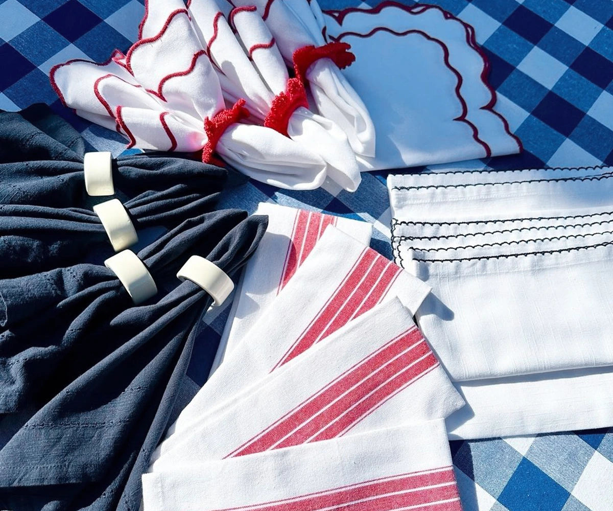 Decorative cloth napkins folded for festive dining setup Decorative cloth napkins folded for festive dining setup