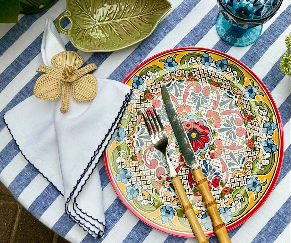 Elegant striped tablecloth enhancing the look of a dining space Elegant striped tablecloth enhancing the look of a dining space