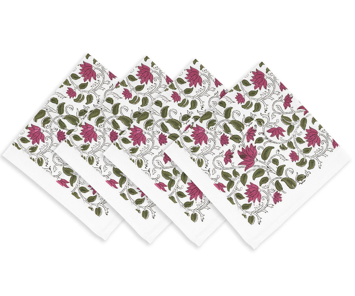 Stylish floral napkins placed with plates and cutlery Stylish floral napkins placed with plates and cutlery