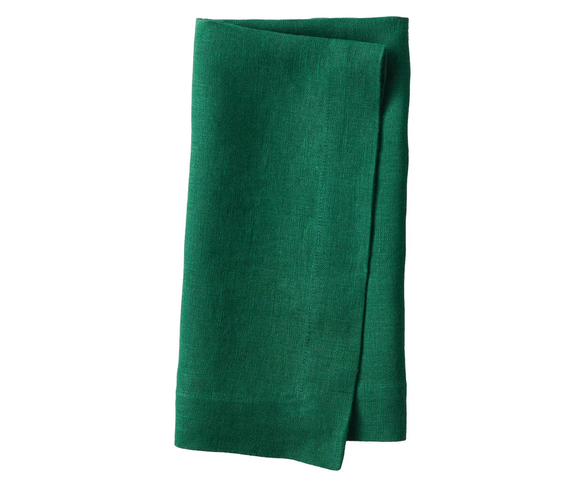 green linen napkins paired with silver cutlery green linen napkins paired with silver cutlery