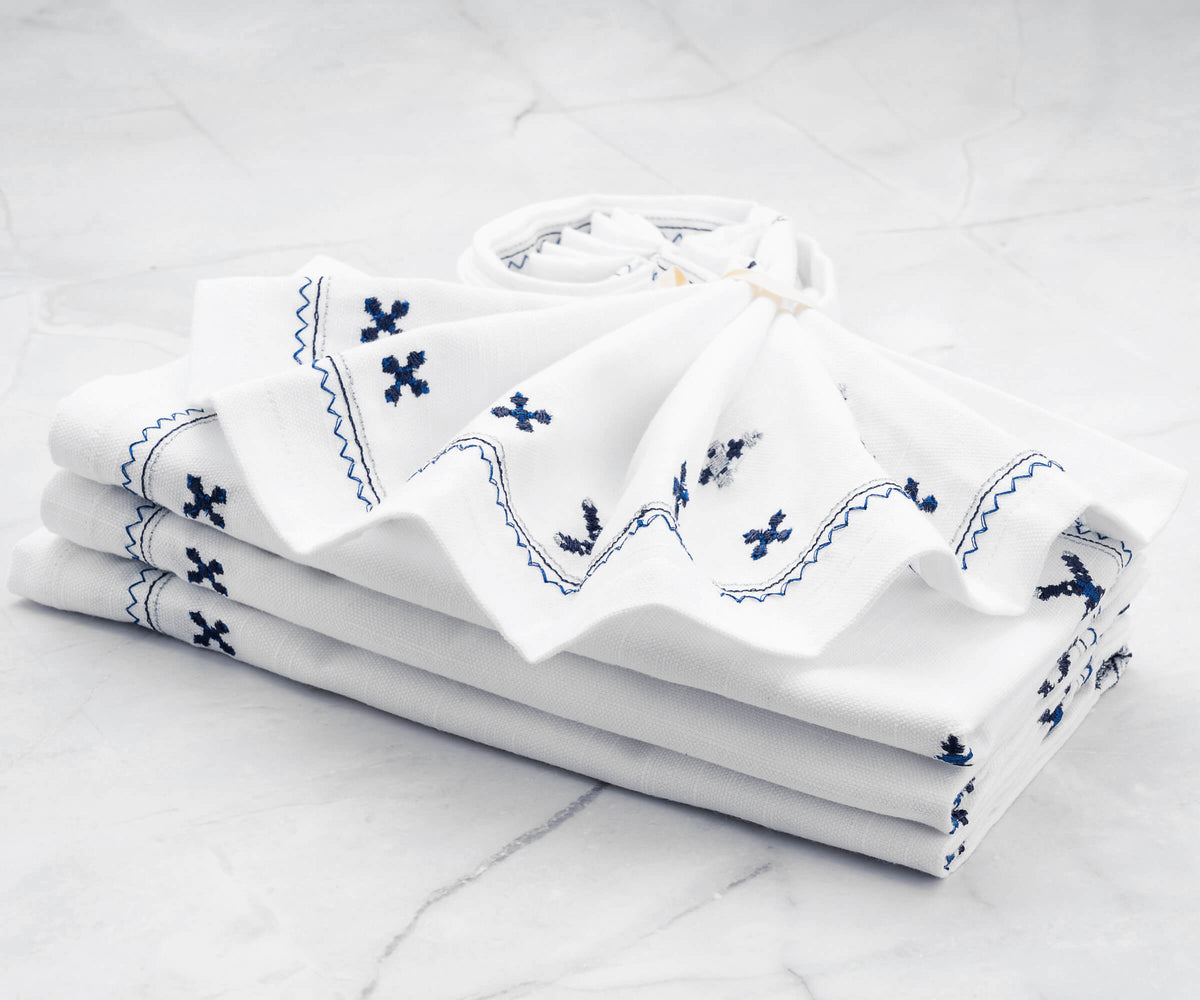 White dinner napkins offer a classic and clean look suitable for any occasion. White dinner napkins offer a classic and clean look suitable for any occasion.