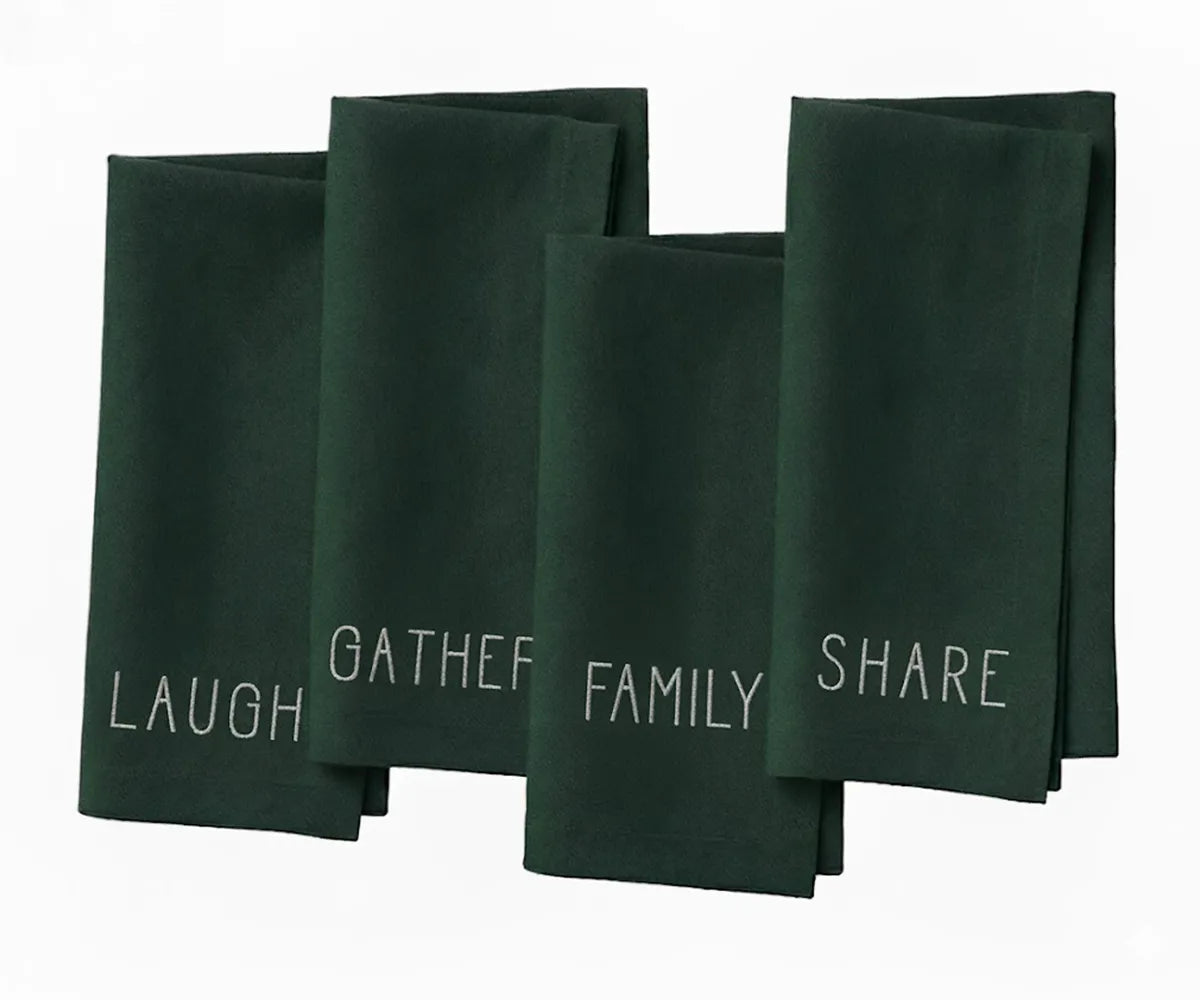 Green embroidered cotton dinner napkin with white stitched “Laugh, Family, Share, Gather” text — farmhouse table decor. Green embroidered cotton dinner napkin with white stitched “Laugh, Family, Share, Gather” text — farmhouse table decor.