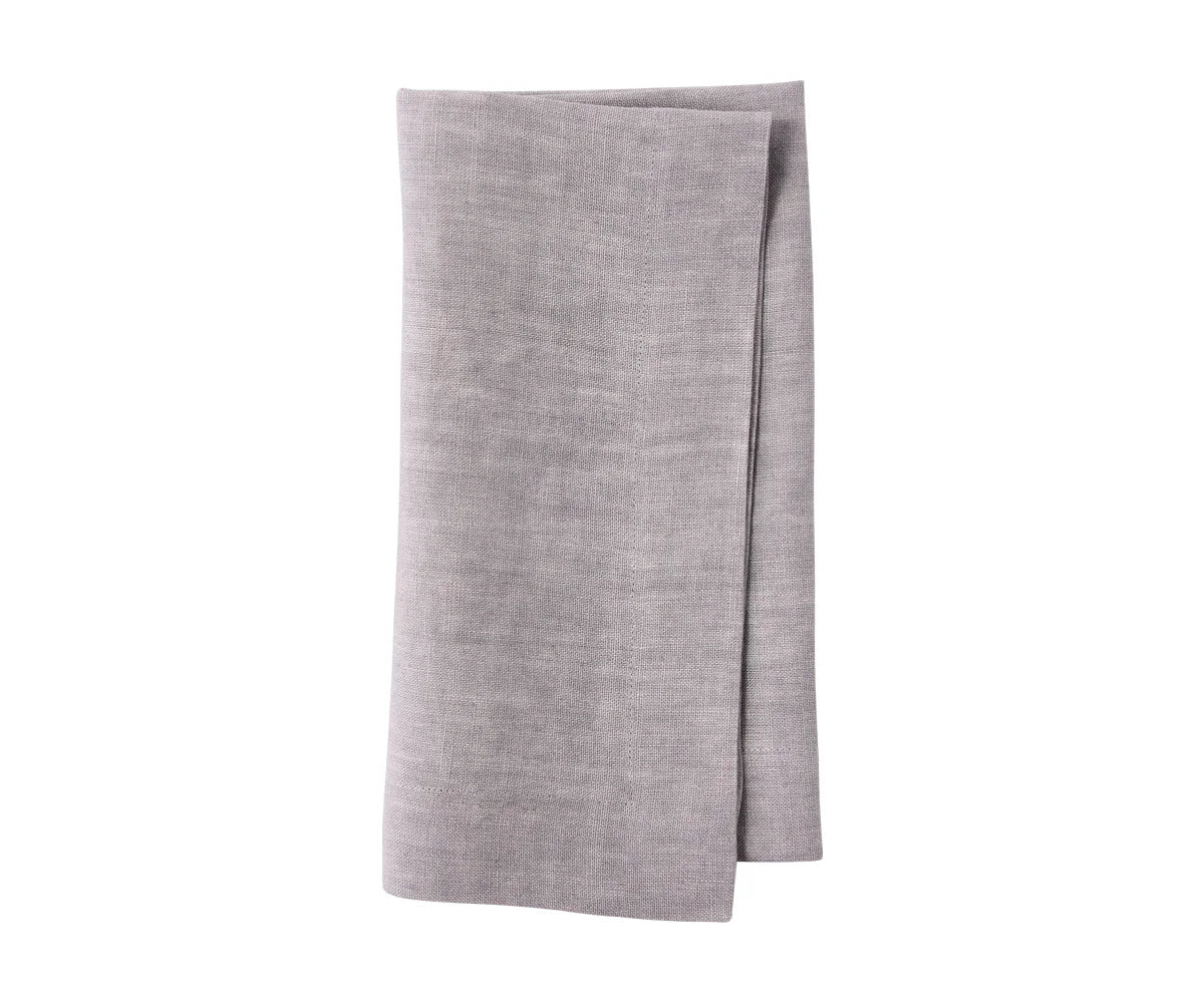 Grey linen napkins complementing a modern table setup Grey linen napkins complementing a modern table setup