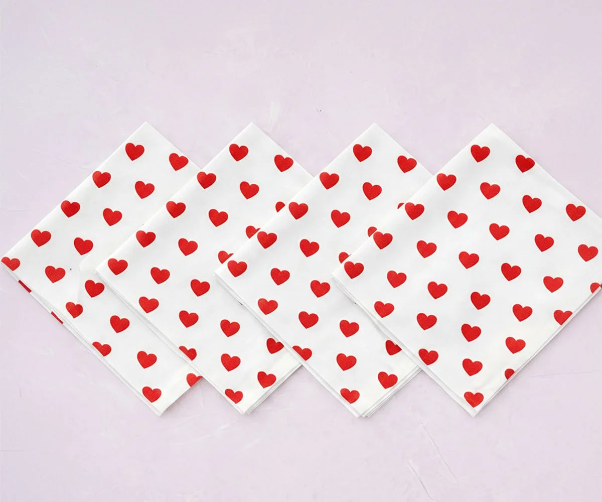 White cloth napkins with red heart print White cloth napkins with red heart print