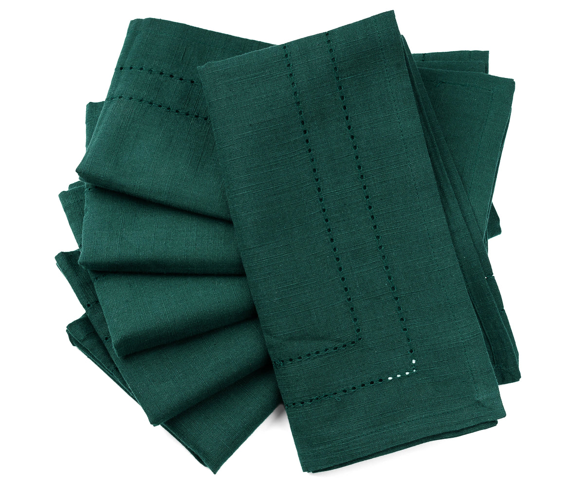 Forest Green dinner napkin used in formal table setting Forest Green dinner napkin used in formal table setting