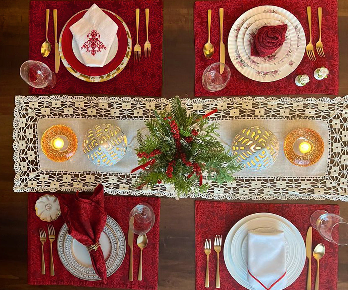 Add a touch of elegance to your table with these striking red fabric placemats, offering both style and protectio Add a touch of elegance to your table with these striking red fabric placemats, offering both style and protectio