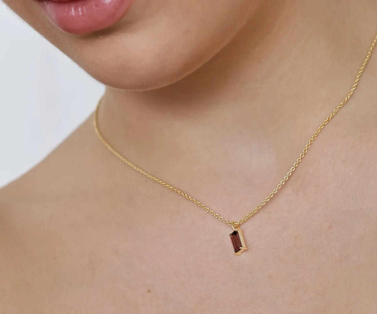14K yellow gold plated rectangle pendant on model 14K yellow gold plated rectangle pendant on model