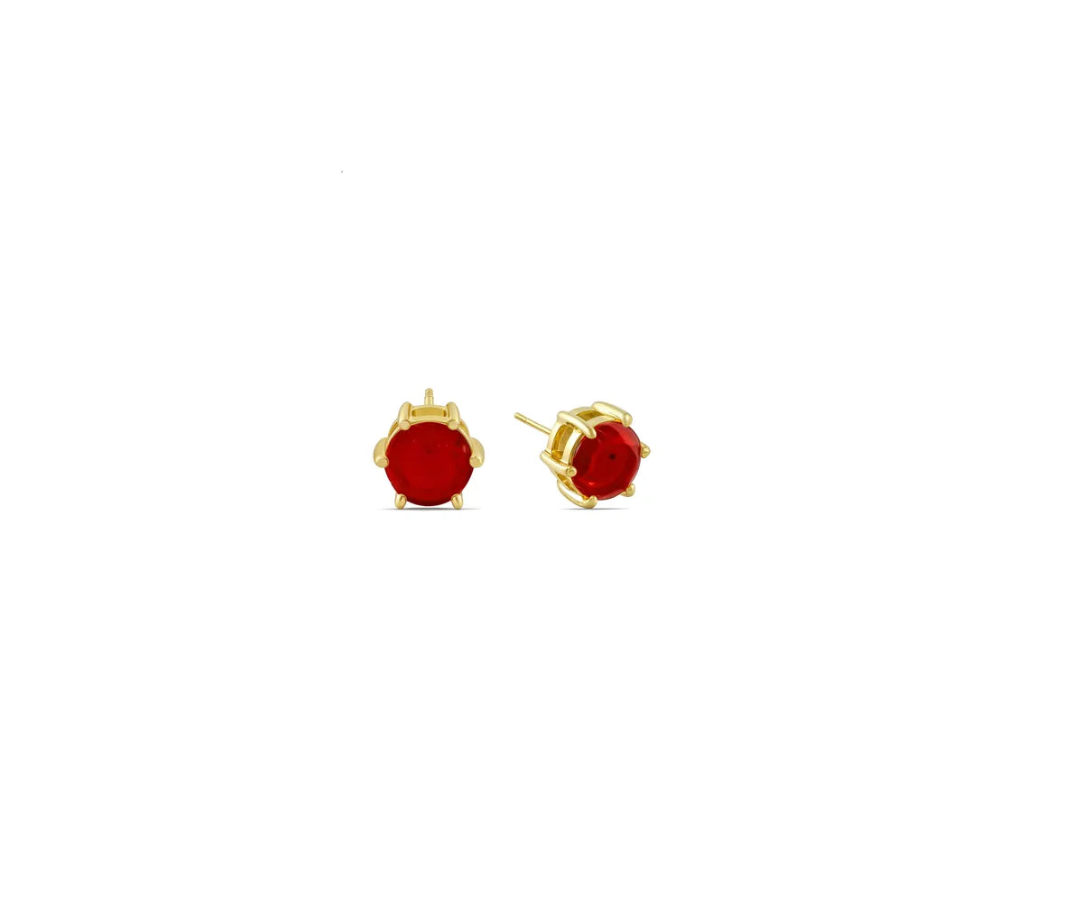Side view of ruby stud earrings with secure push-back closure on white background Side view of ruby stud earrings with secure push-back closure on white background