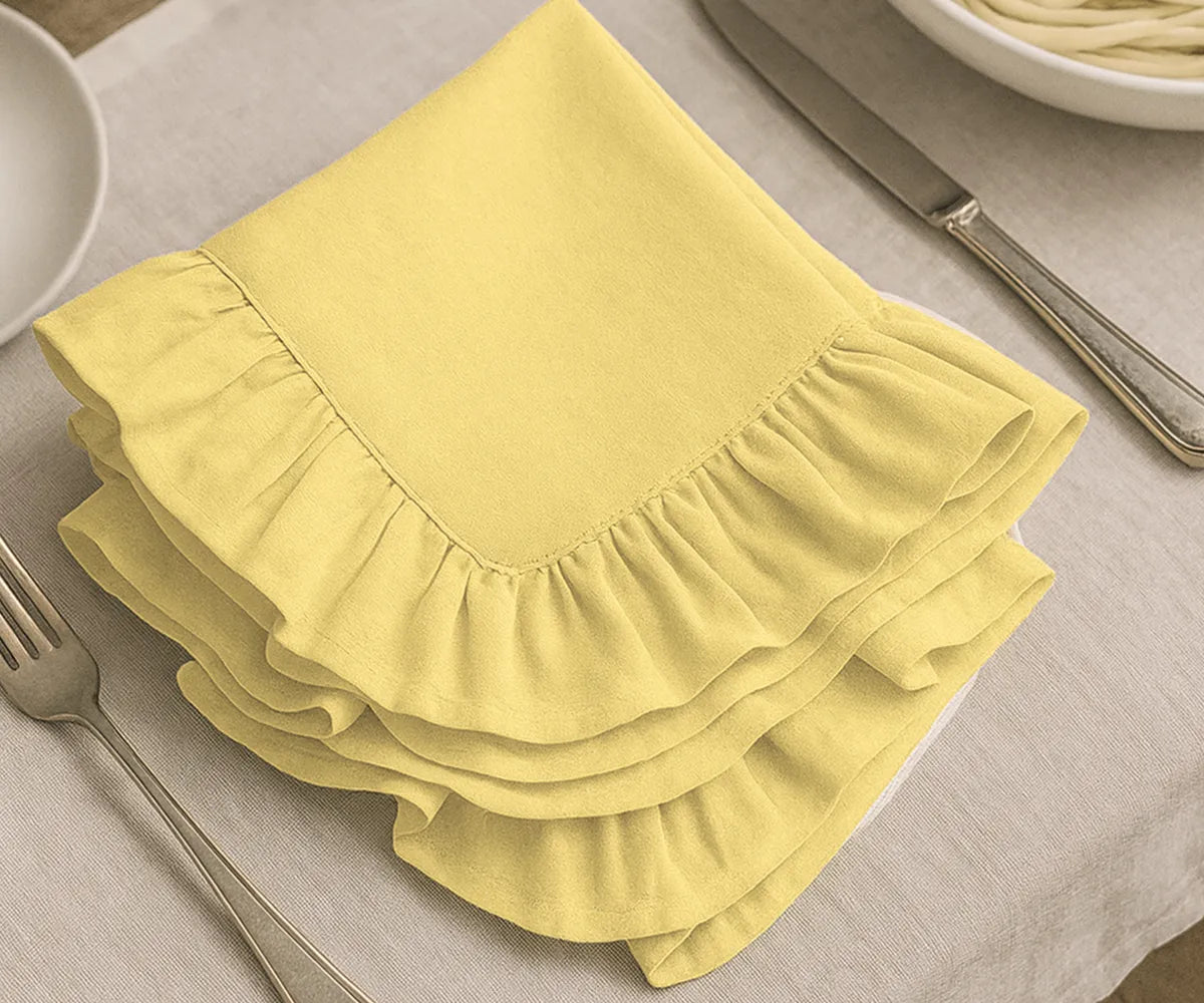 Lemon yellow cotton ruffle edge cloth napkins, soft and reusable dinner napkins for weddings, parties, family gatherings, and farmhouse table décor. Lemon yellow cotton ruffle edge cloth napkins, soft and reusable dinner napkins for weddings, parties, family gatherings, and farmhouse table décor.