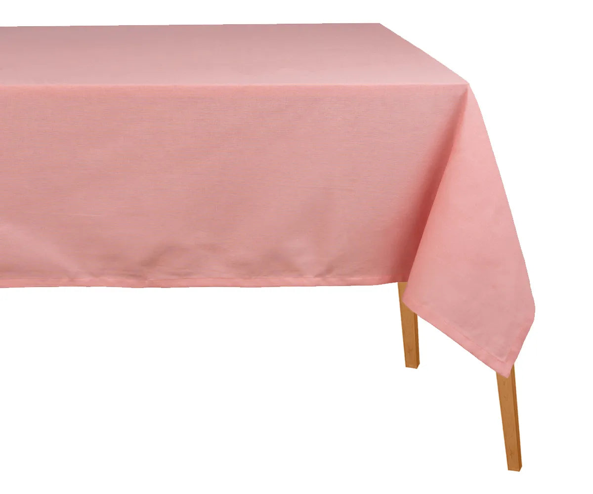 Light pink cotton rectangle tablecloth on dining table Light pink cotton rectangle tablecloth on dining table