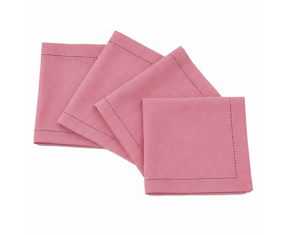 Set of pink napkins with hemmed edges on a white background Set of pink napkins with hemmed edges on a white background