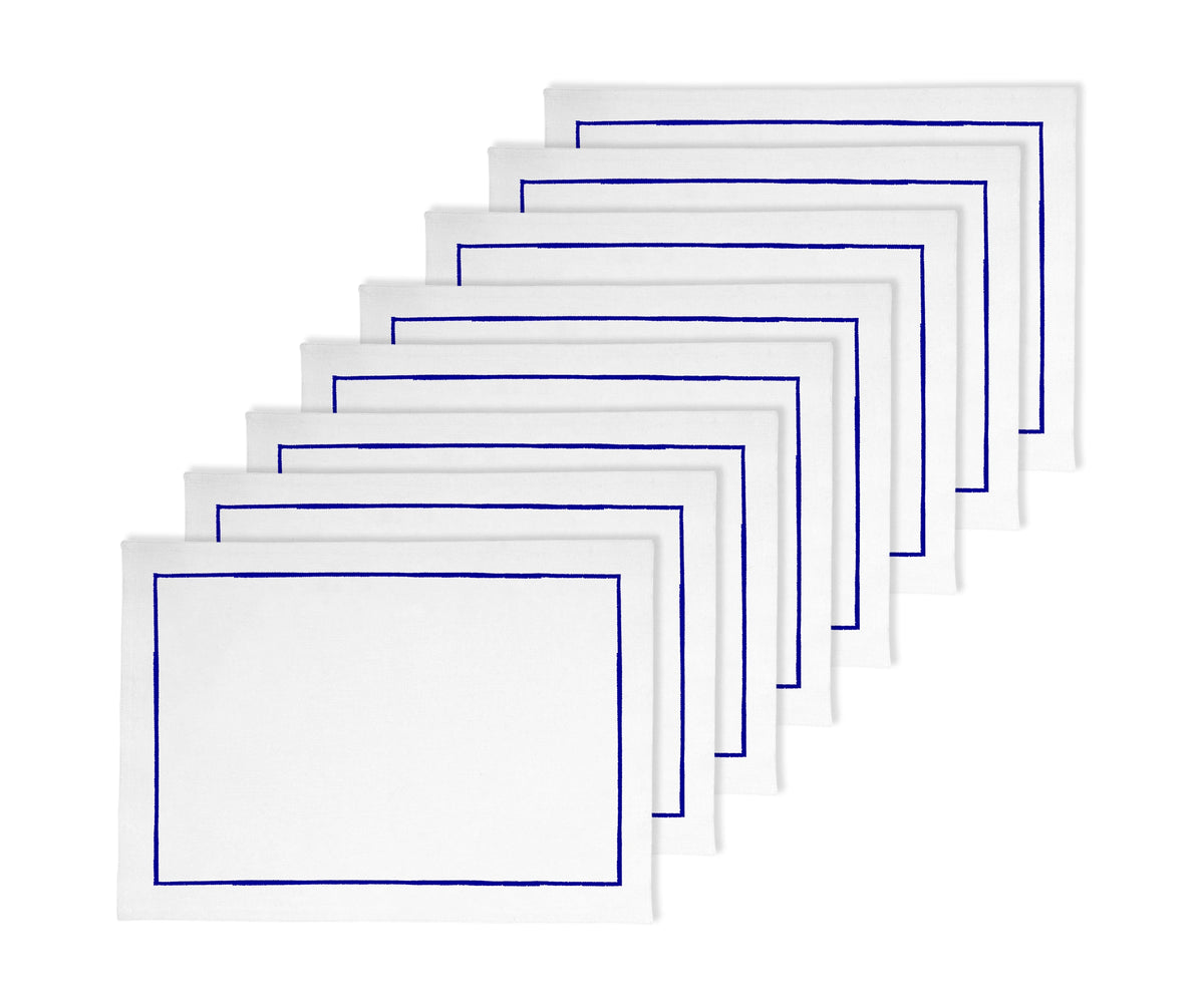 Add a pop of color and elegance to your dining space with these blue cotton placemats Add a pop of color and elegance to your dining space with these blue cotton placemats