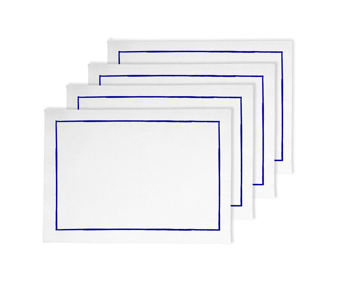 Royal blue cotton placemats with embroidered accents, 13x18 inches, available in sets of 4 and 8. Royal blue cotton placemats with embroidered accents, 13x18 inches, available in sets of 4 and 8.