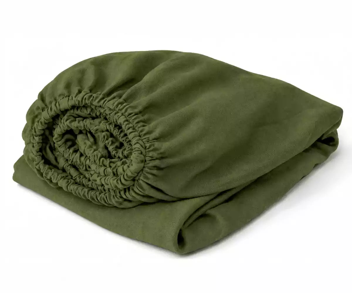 Olive green linen fitted sheet made from breathable natural linen, deep pocket fitted bed sheet for a soft, comfortable, and relaxed sleep experience. Olive green linen fitted sheet made from breathable natural linen, deep pocket fitted bed sheet for a soft, comfortable, and relaxed sleep experience.