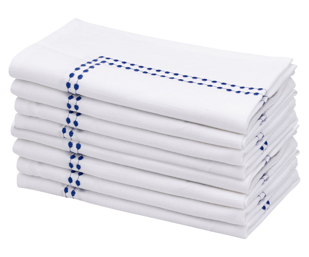 Crisp white dinner napkins, perfect for elegant table settings and special occasions. Crisp white dinner napkins, perfect for elegant table settings and special occasions.