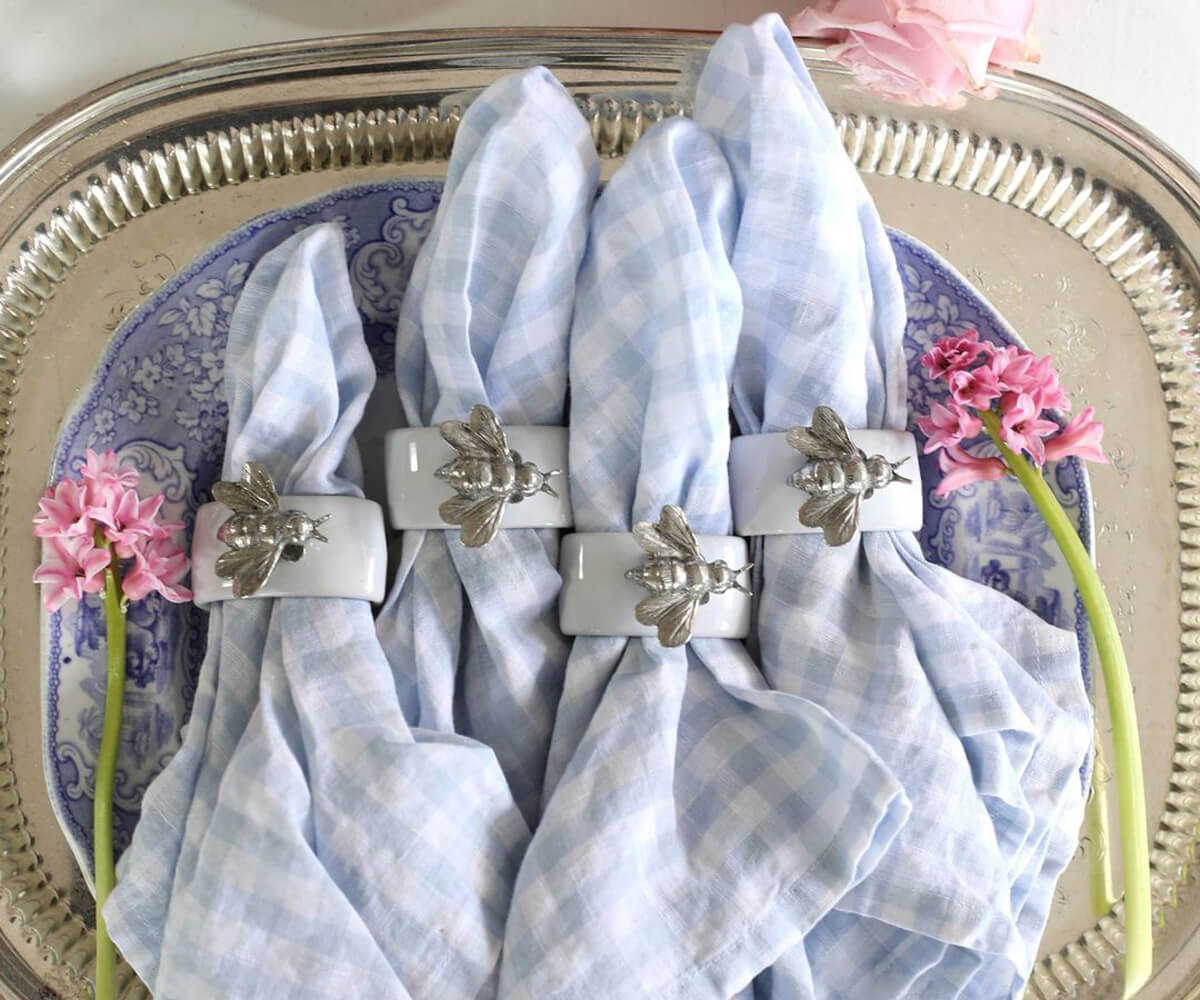 Blue checkered napkins crafted to enhance the elegance of your reception tables. Blue checkered napkins crafted to enhance the elegance of your reception tables.