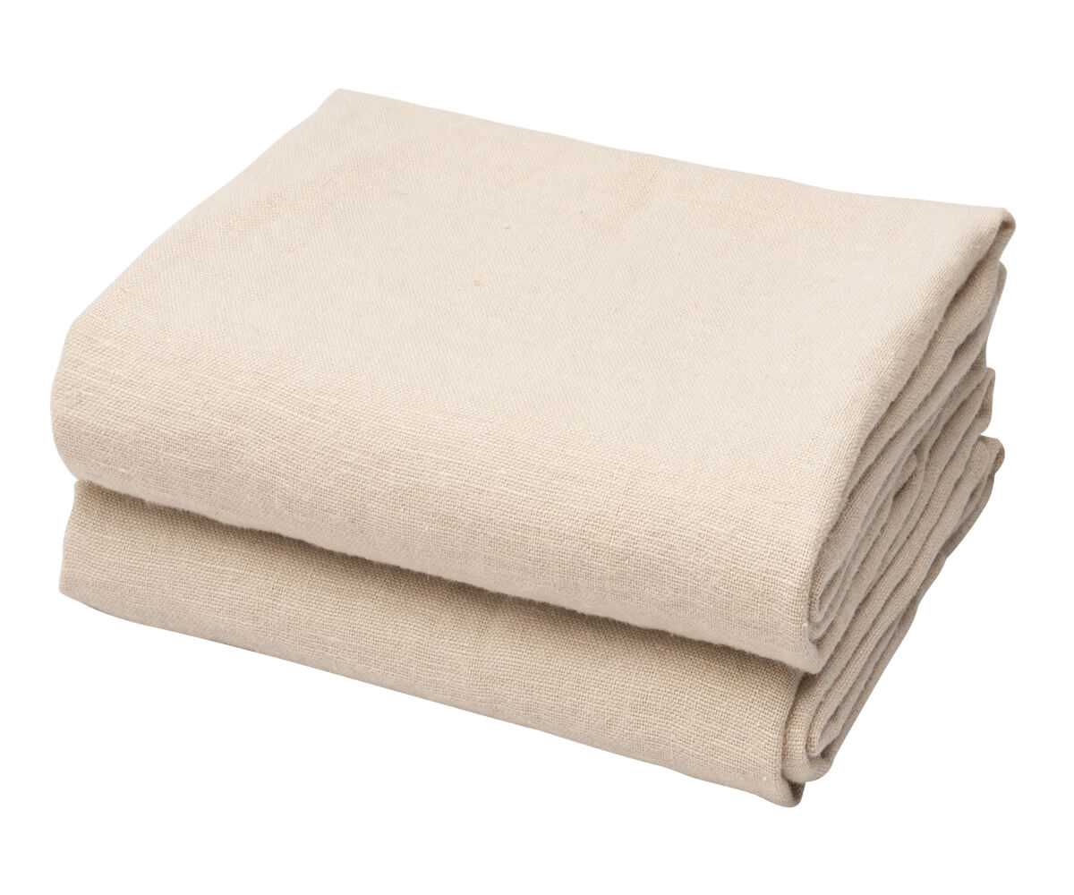 A folded beige linen kitchen towel on a white background. A folded beige linen kitchen towel on a white background.