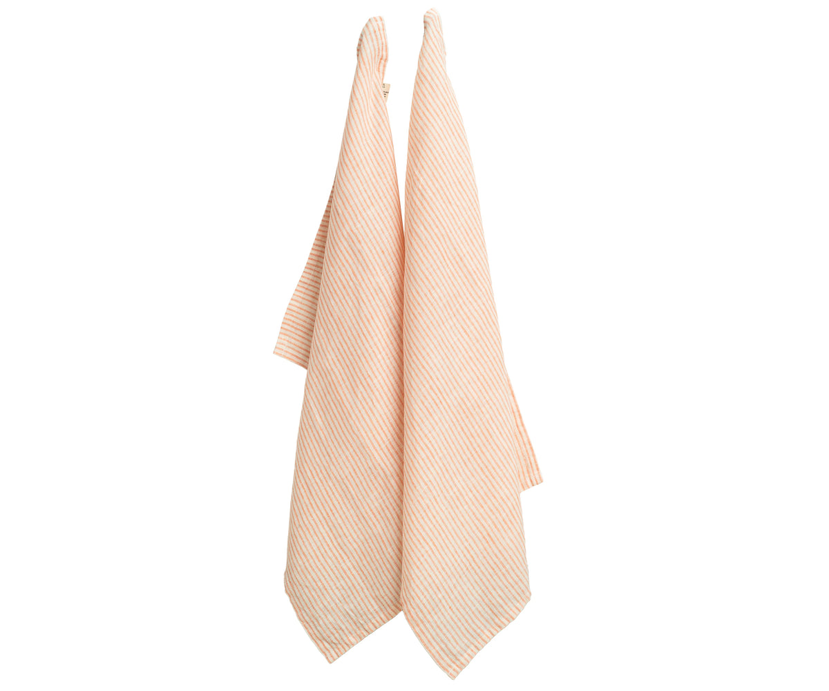 Set of 6 orange striped linen dish towels folded neatly on a rustic countertop Set of 6 orange striped linen dish towels folded neatly on a rustic countertop