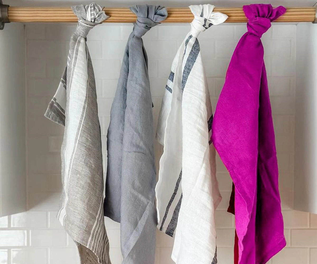 Close-up of linen towel fabric with visible weave pattern and smooth edges Close-up of linen towel fabric with visible weave pattern and smooth edges