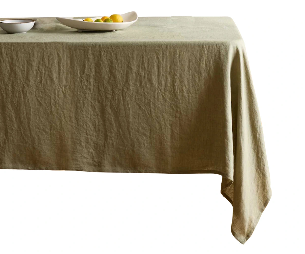 Willow Green European Linen Tablecloth on dining table for elegant dinner setting Willow Green European Linen Tablecloth on dining table for elegant dinner setting