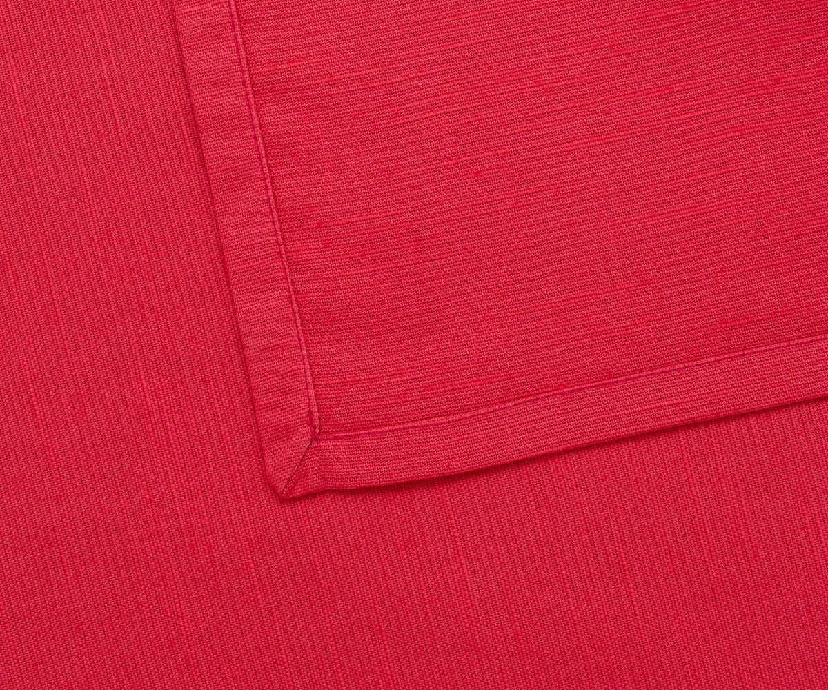 Premium maroon dinner napkin displayed with coordinated table décor and glassware. Premium maroon dinner napkin displayed with coordinated table décor and glassware.