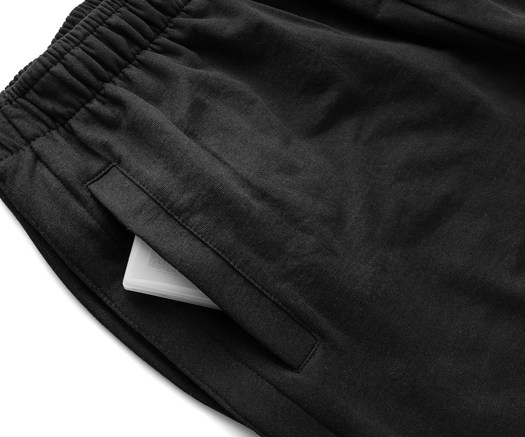 Black shorts with a white label on a white background Black shorts with a white label on a white background